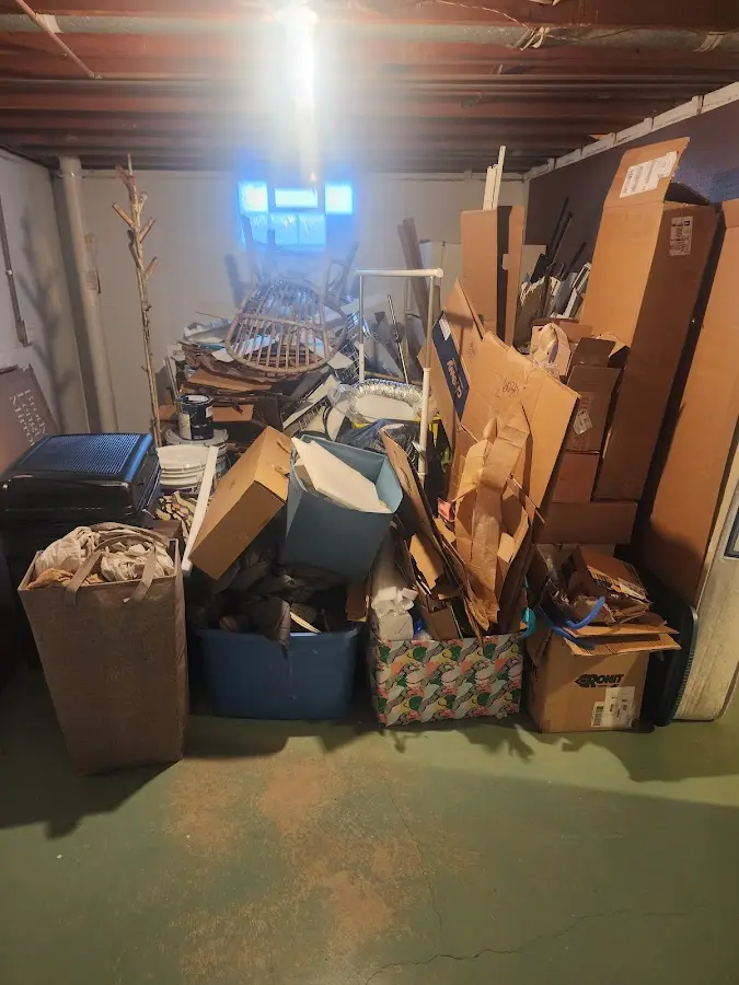 Roll-off dumpster container at job site for 2 Yard Dumpster Rental in Molalla